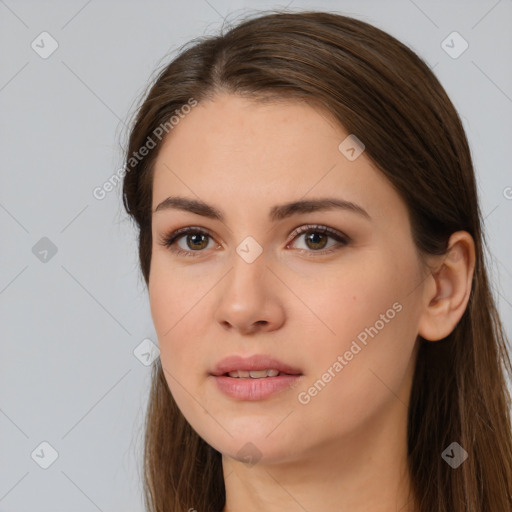 Neutral white young-adult female with long  brown hair and brown eyes