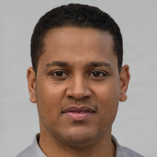 Neutral latino young-adult male with short  brown hair and brown eyes