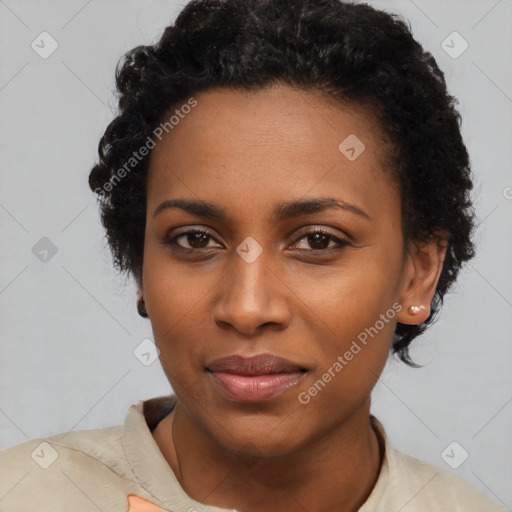 Joyful black young-adult female with short  black hair and brown eyes