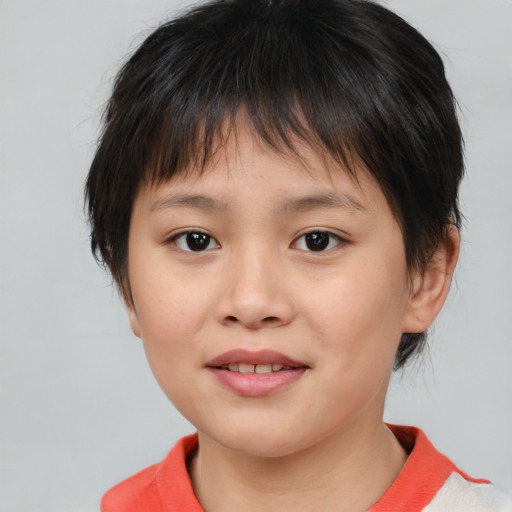 Joyful white child female with medium  brown hair and brown eyes