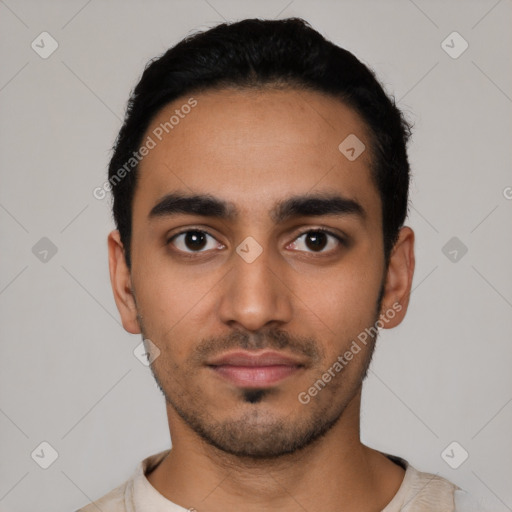 Neutral latino young-adult male with short  black hair and brown eyes