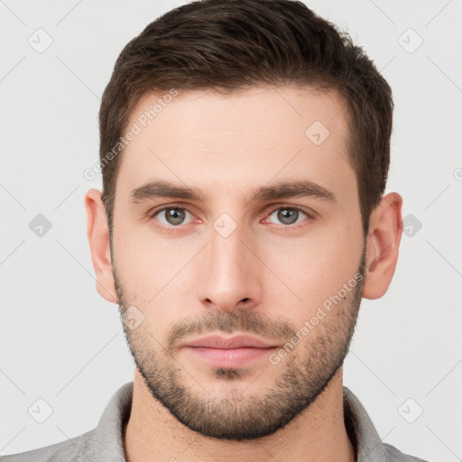 Neutral white young-adult male with short  brown hair and grey eyes