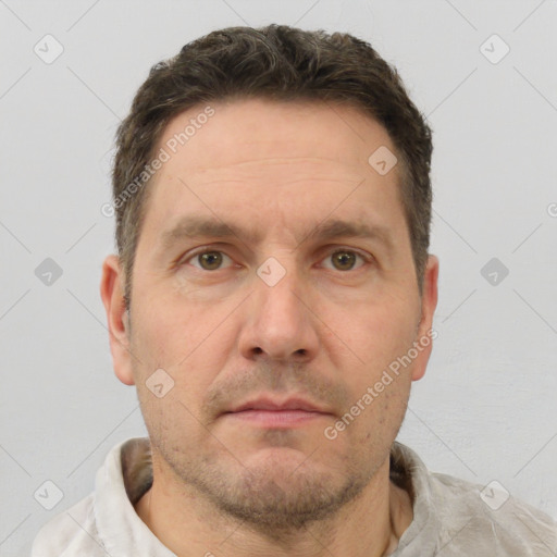 Neutral white adult male with short  brown hair and brown eyes