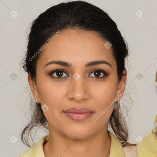 Joyful latino young-adult female with medium  brown hair and brown eyes