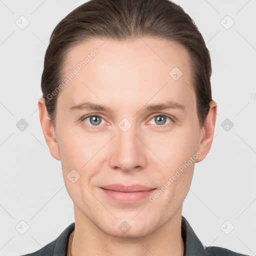 Joyful white young-adult female with short  brown hair and grey eyes