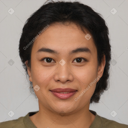 Joyful latino young-adult female with short  brown hair and brown eyes