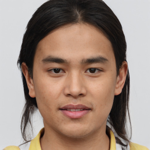 Joyful white young-adult male with medium  brown hair and brown eyes