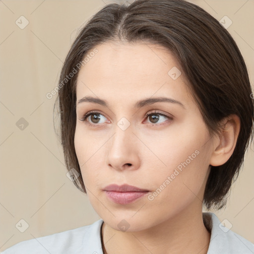 Neutral white young-adult female with medium  brown hair and brown eyes