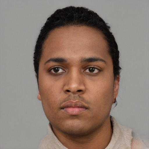 Neutral black young-adult male with short  black hair and brown eyes