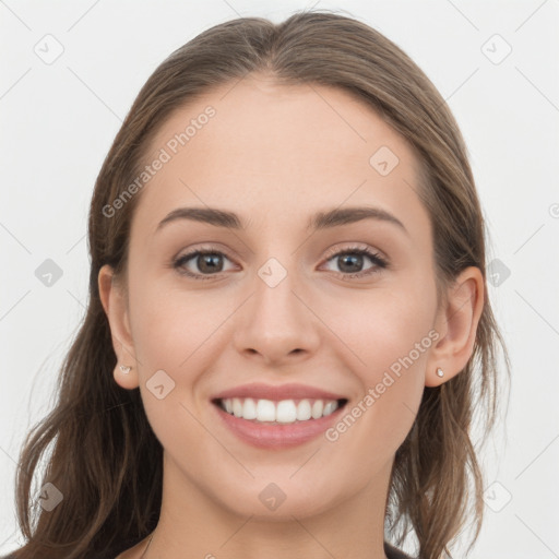 Joyful white young-adult female with long  brown hair and grey eyes