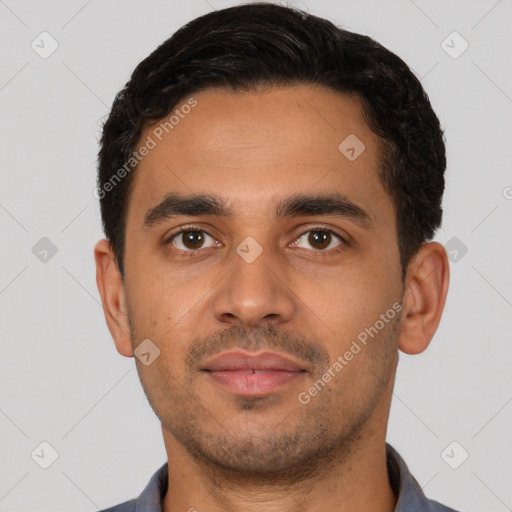 Neutral latino young-adult male with short  black hair and brown eyes