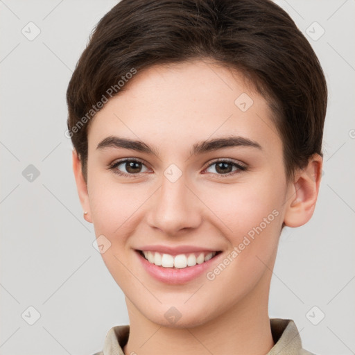 Joyful white young-adult female with short  brown hair and brown eyes