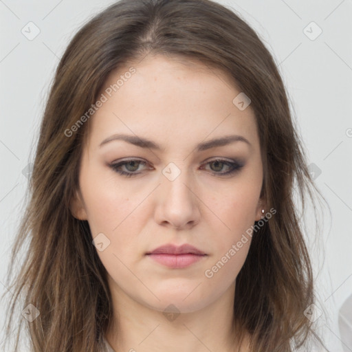 Neutral white young-adult female with long  brown hair and brown eyes