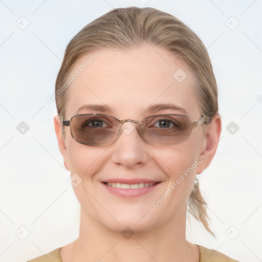 Joyful white young-adult female with medium  brown hair and blue eyes