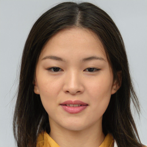 Joyful asian young-adult female with medium  brown hair and brown eyes