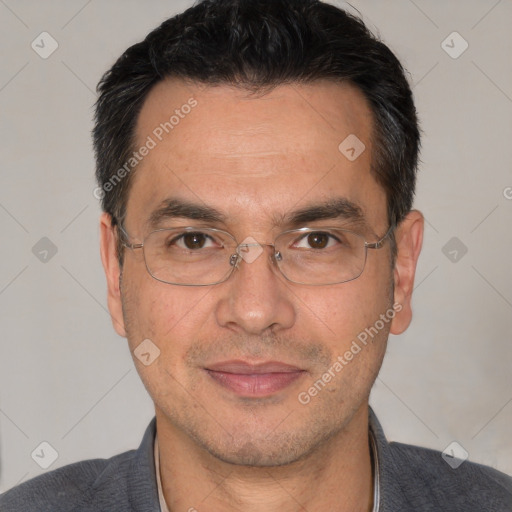 Joyful white adult male with short  black hair and brown eyes