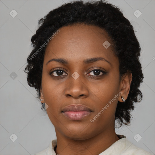 Neutral black young-adult female with medium  black hair and brown eyes