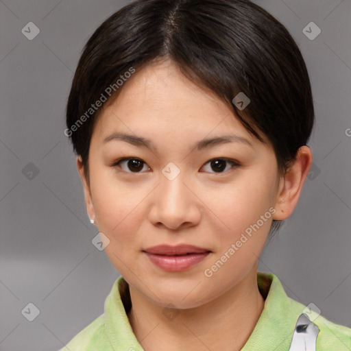 Joyful asian young-adult female with short  brown hair and brown eyes