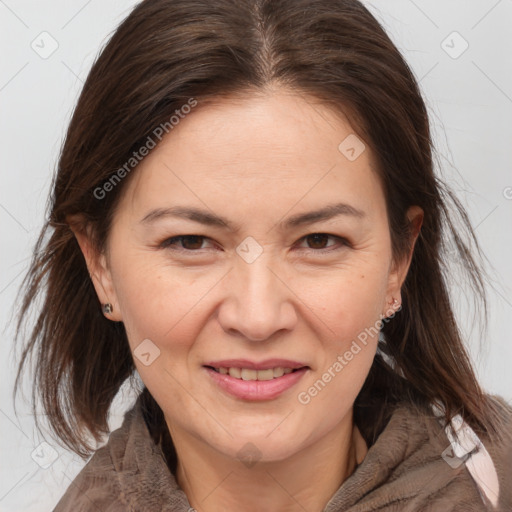 Joyful white adult female with medium  brown hair and brown eyes