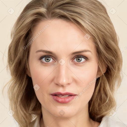 Joyful white young-adult female with medium  brown hair and green eyes