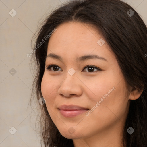 Joyful asian young-adult female with long  brown hair and brown eyes