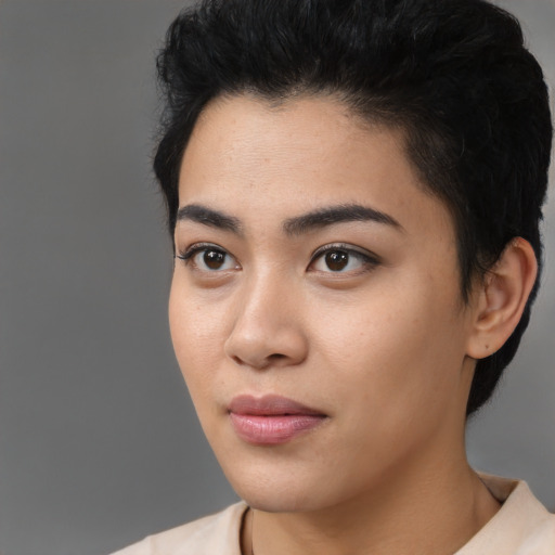 Neutral asian young-adult female with short  black hair and brown eyes