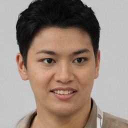 Joyful asian young-adult female with short  brown hair and brown eyes