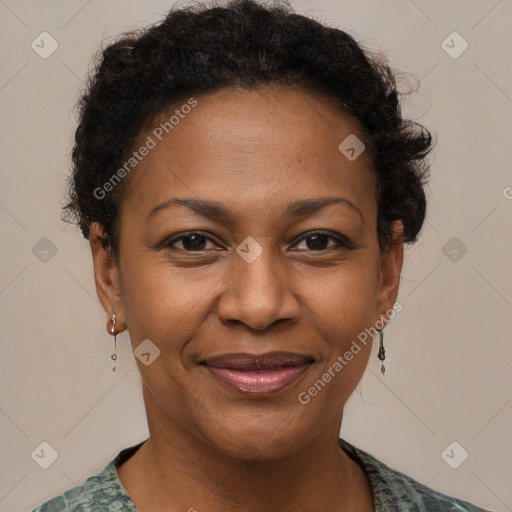 Joyful black adult female with short  brown hair and brown eyes