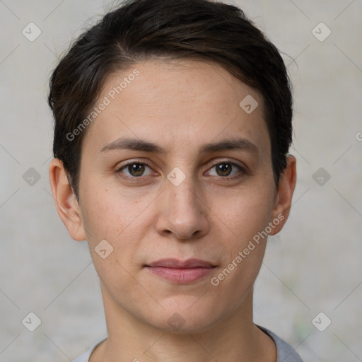 Joyful white young-adult female with short  brown hair and brown eyes