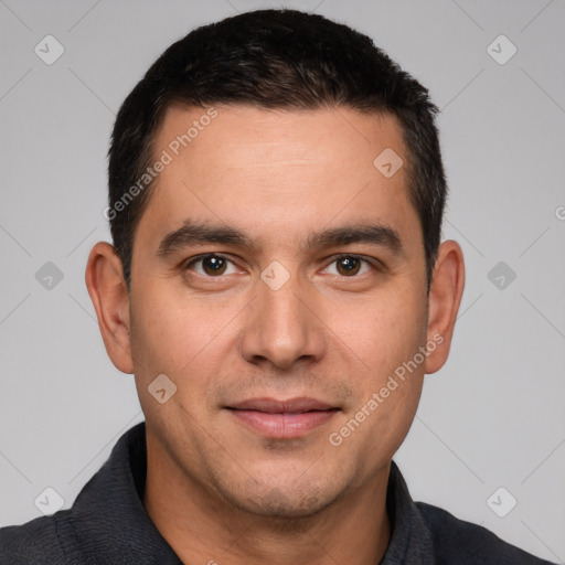 Joyful white young-adult male with short  black hair and brown eyes