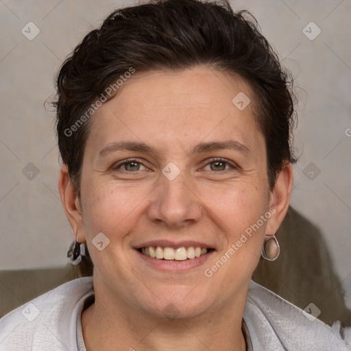 Joyful white adult female with short  brown hair and brown eyes