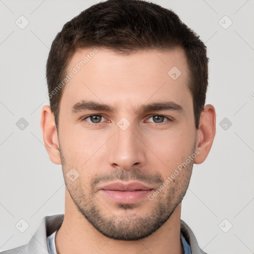 Neutral white young-adult male with short  brown hair and brown eyes