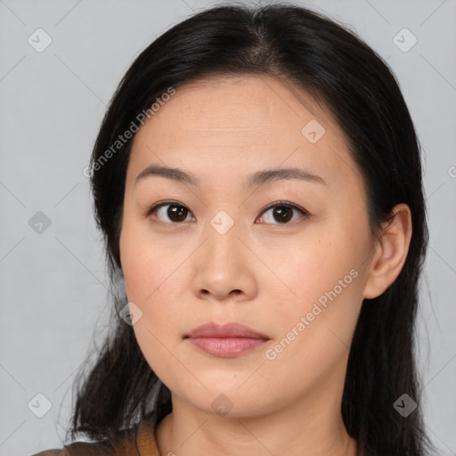 Neutral asian young-adult female with medium  brown hair and brown eyes