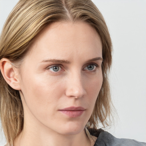 Neutral white young-adult female with medium  brown hair and grey eyes