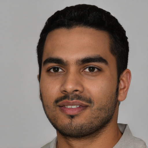 Neutral latino young-adult male with short  black hair and brown eyes