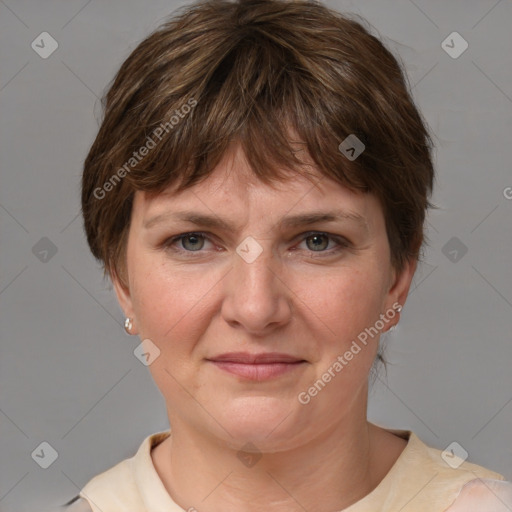 Joyful white adult female with medium  brown hair and grey eyes