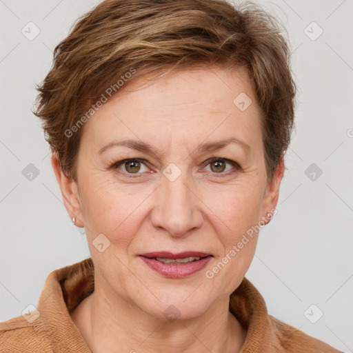 Joyful white adult female with short  brown hair and grey eyes