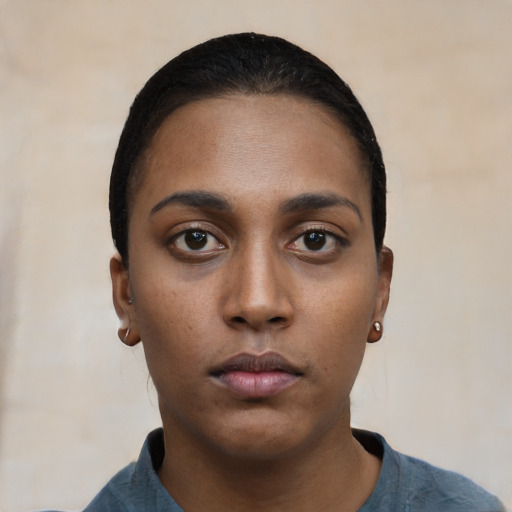 Neutral black young-adult female with short  black hair and brown eyes