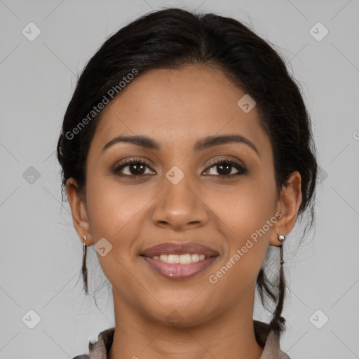 Joyful latino young-adult female with long  brown hair and brown eyes