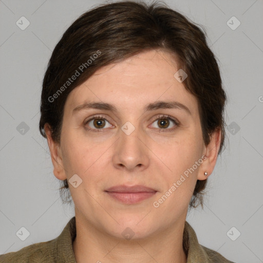 Joyful white adult female with medium  brown hair and grey eyes