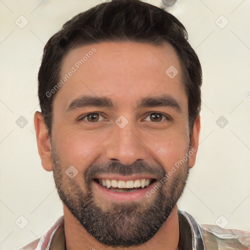 Joyful white young-adult male with short  black hair and brown eyes