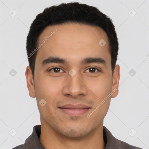 Joyful latino young-adult male with short  black hair and brown eyes