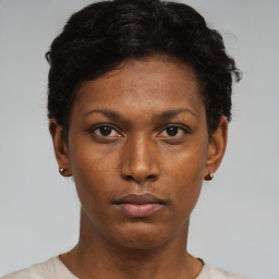 Neutral black young-adult female with short  black hair and brown eyes