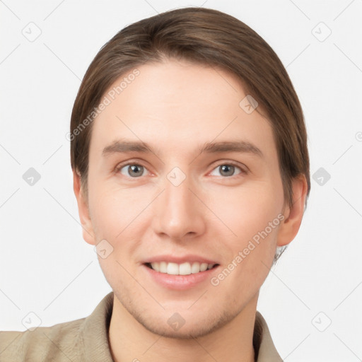 Joyful white young-adult female with short  brown hair and grey eyes