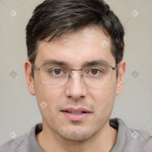 Joyful white adult male with short  brown hair and brown eyes