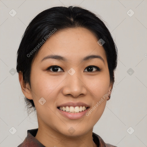 Joyful asian young-adult female with medium  black hair and brown eyes