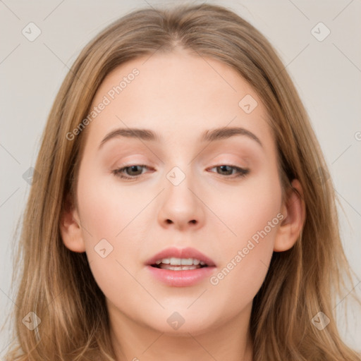 Neutral white young-adult female with long  brown hair and brown eyes