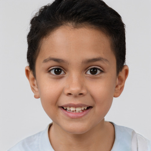 Joyful white child female with short  brown hair and brown eyes