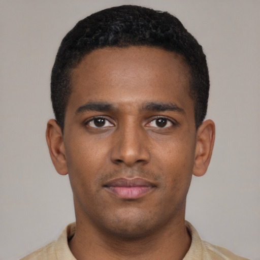 Neutral black young-adult male with short  black hair and brown eyes