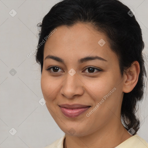 Joyful latino young-adult female with medium  brown hair and brown eyes